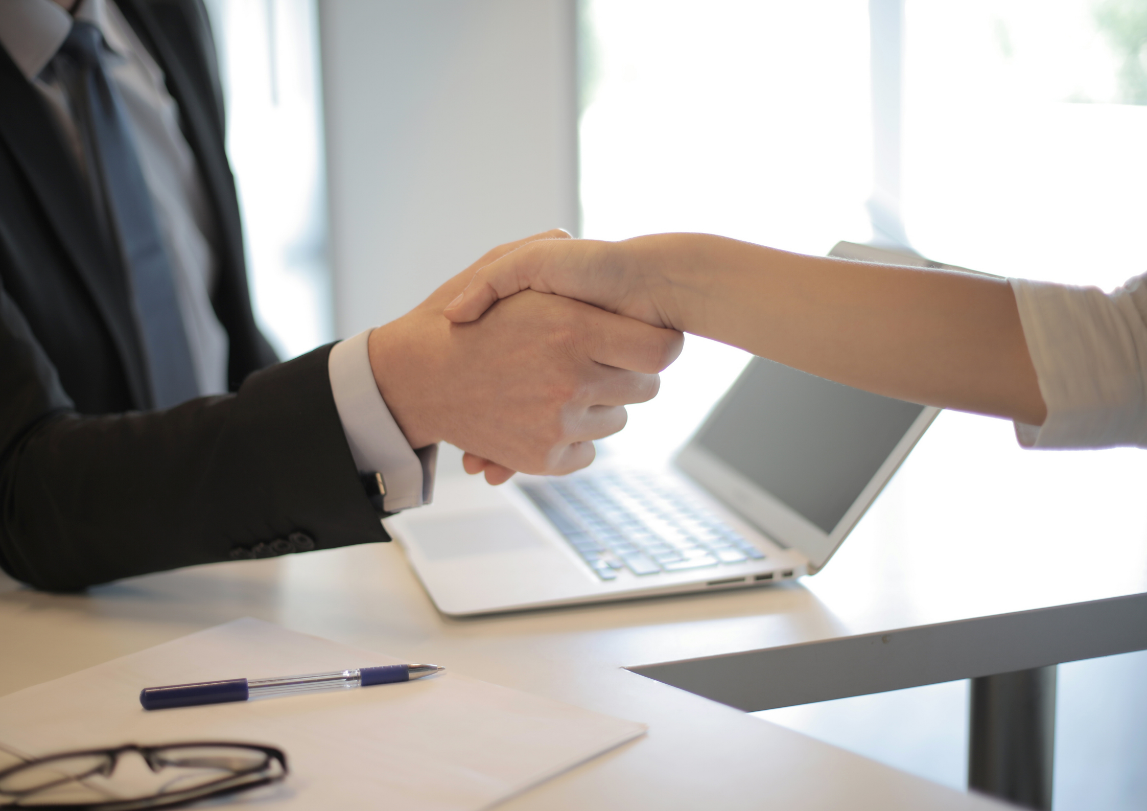 Two people shaking hands